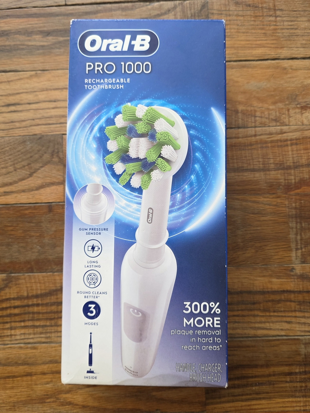 Oral-B PRO 1000 Rechargeable Electric Toothbrush - White/Green Brush Head